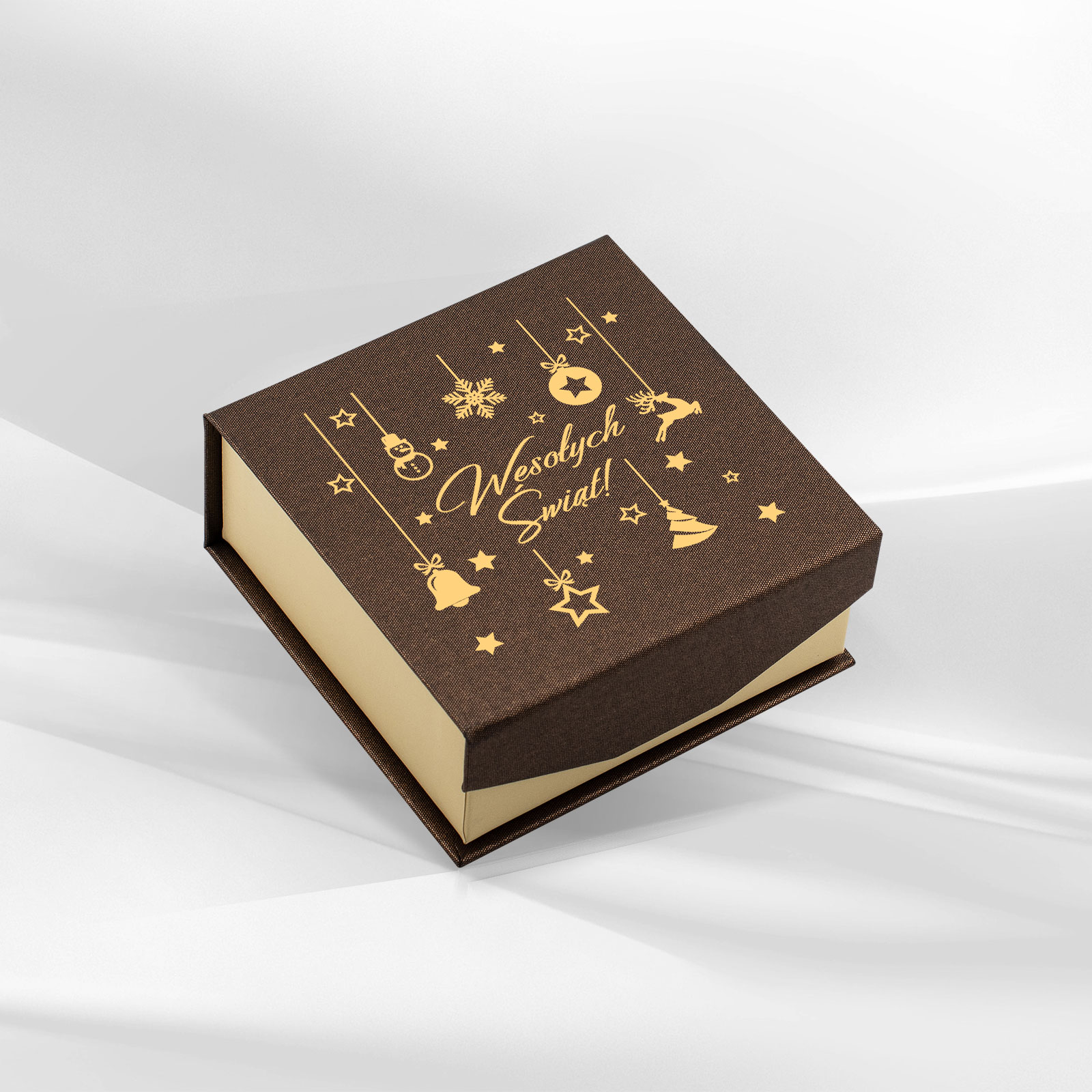 Eleganckie pudełko jubilerskie w brązowym kolorze z magicznym świątecznym motywem