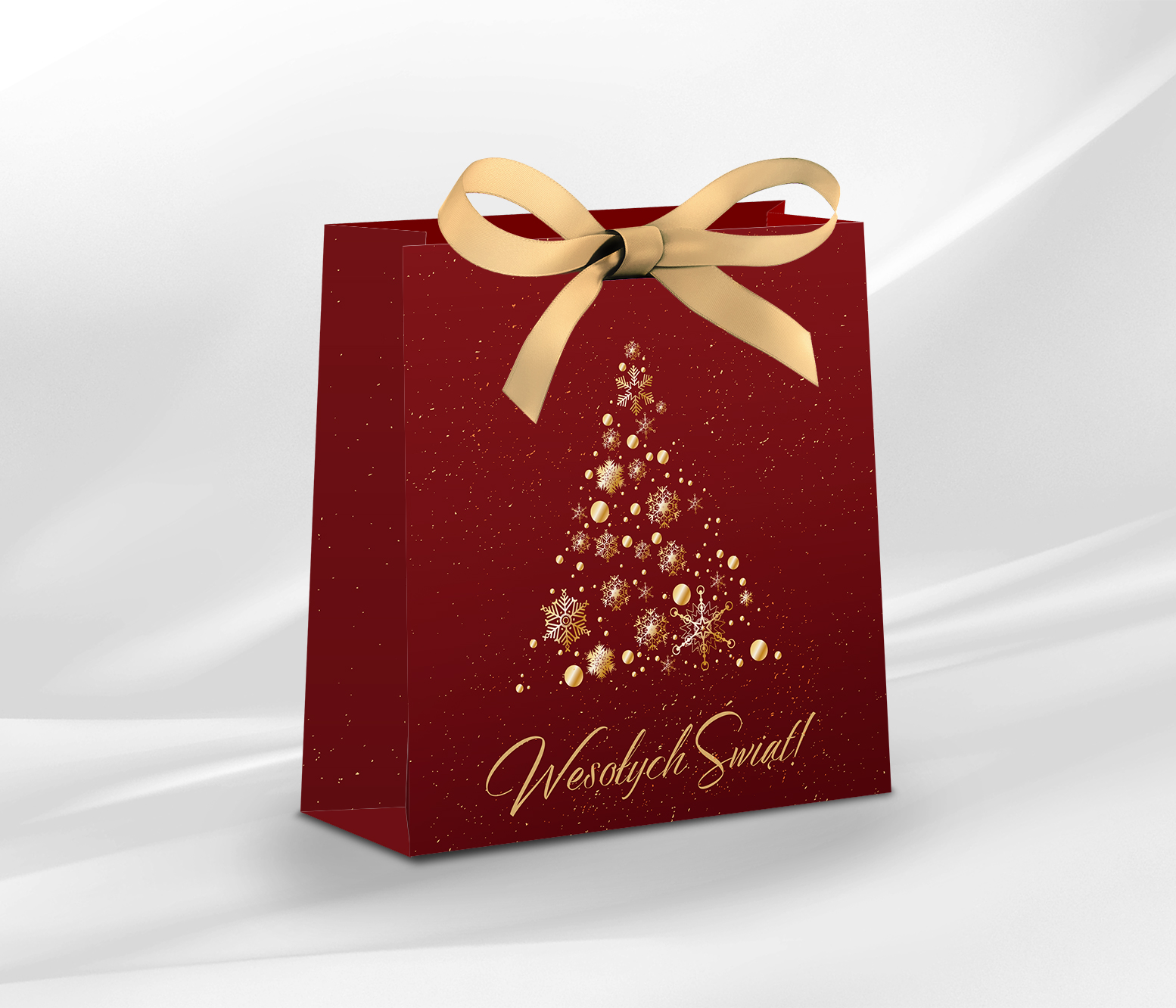 Piękna, świąteczna torebka jubilerska z motywem choinki, ozdobiona złotą kokardką