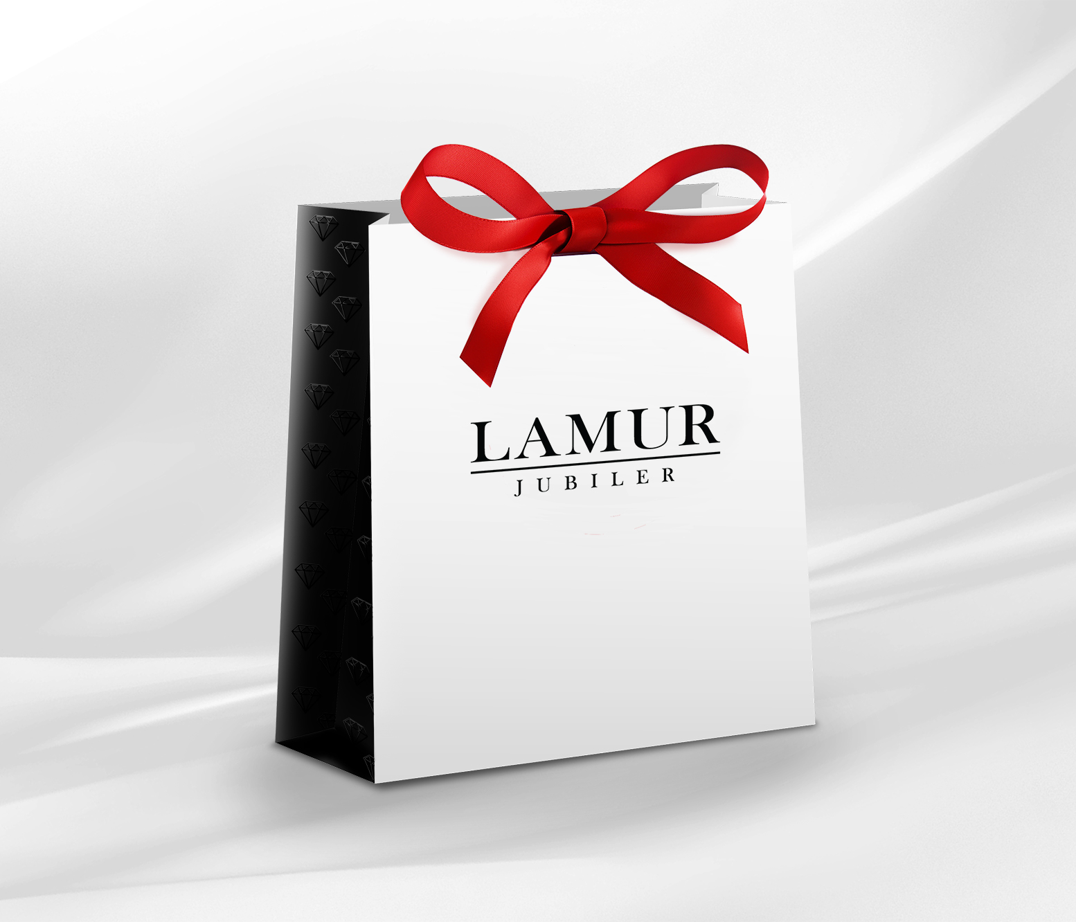 Piękna, klasyczna torebka jubilerska z logo LAMUR, ozdobiona czerwoną kokardką